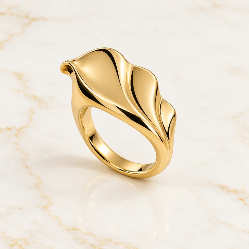 Estuary Fold Ring design preview with three flowing gold planes and a softly scalloped fan crown