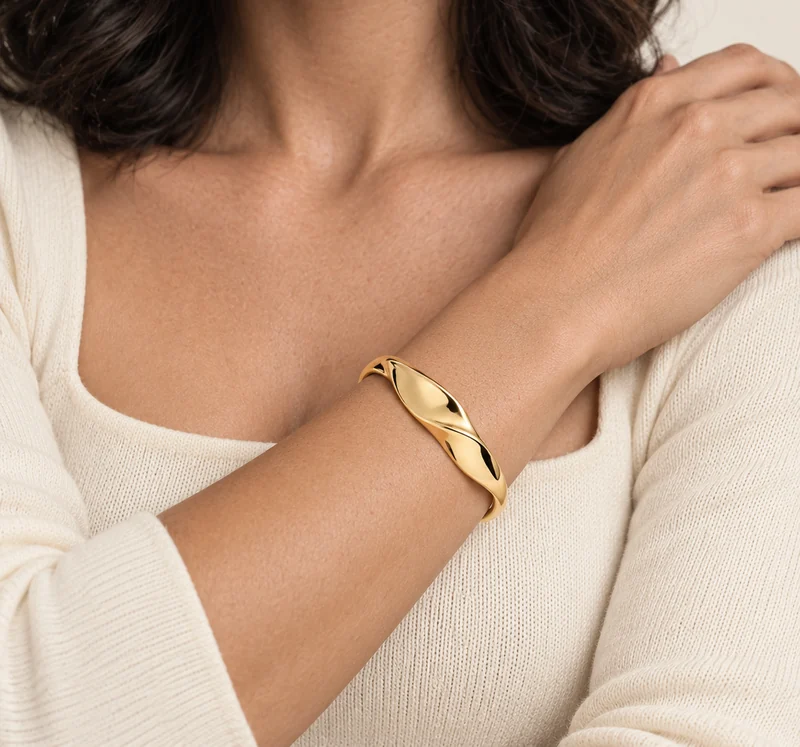 Folded Current Open Cuff design shown on a model, wearing view 1