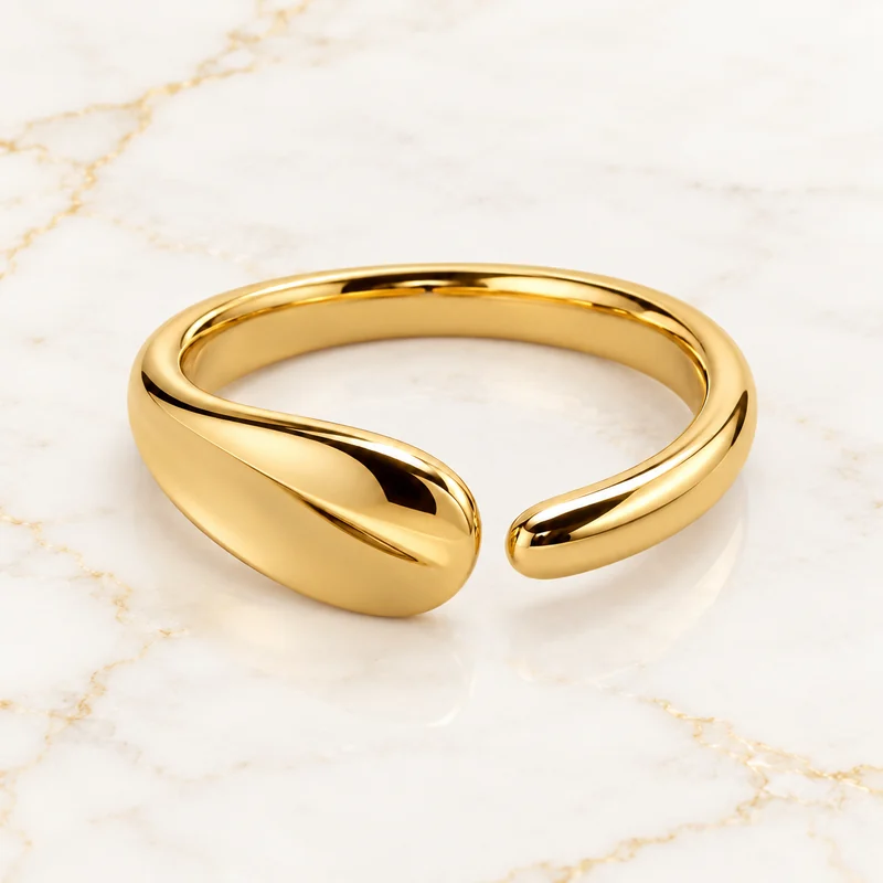 Offset Wrap Ring design preview with unequal rounded gold ribbon ends and an offset opening