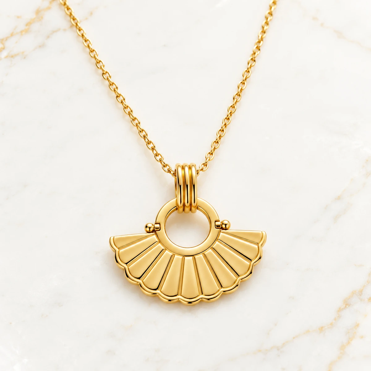 Pivot Tile Pendant design preview with a gold half-disc fan, radial ribs and open circular eye