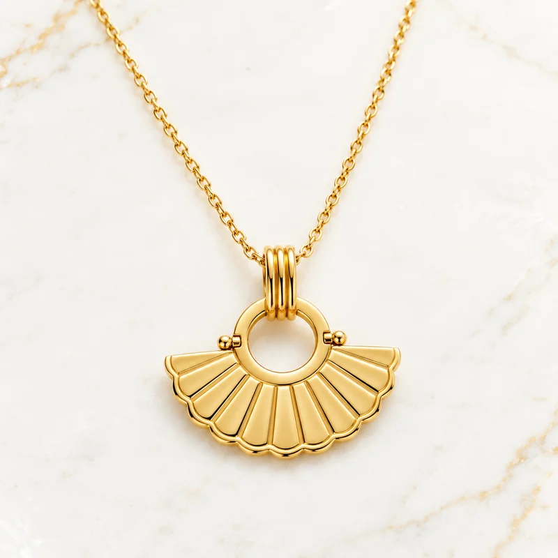 Pivot Tile Pendant design preview with a gold half-disc fan, radial ribs and open circular eye