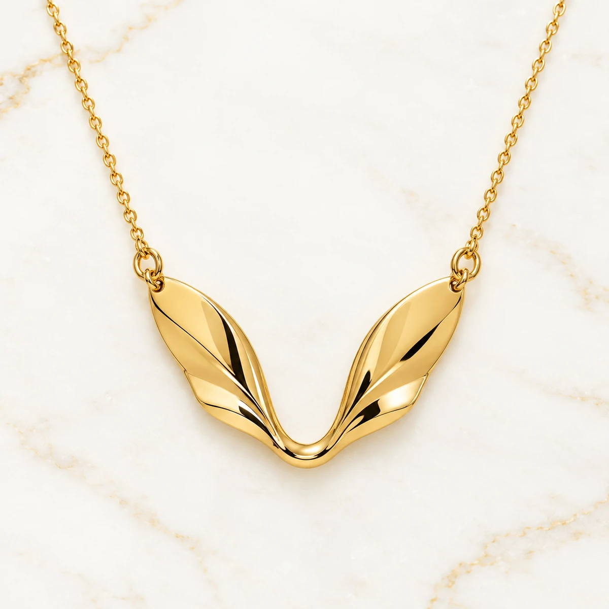 Twin Sail Pendant design preview with two curved gold panels framing an open V